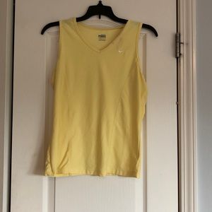 Women’s size L Yellow Nike athletic tank top.